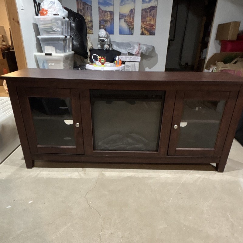 Dark Wood TV Stand w/ 2 Glass Doors, 2 Shelves & Built in fireplace/space heater