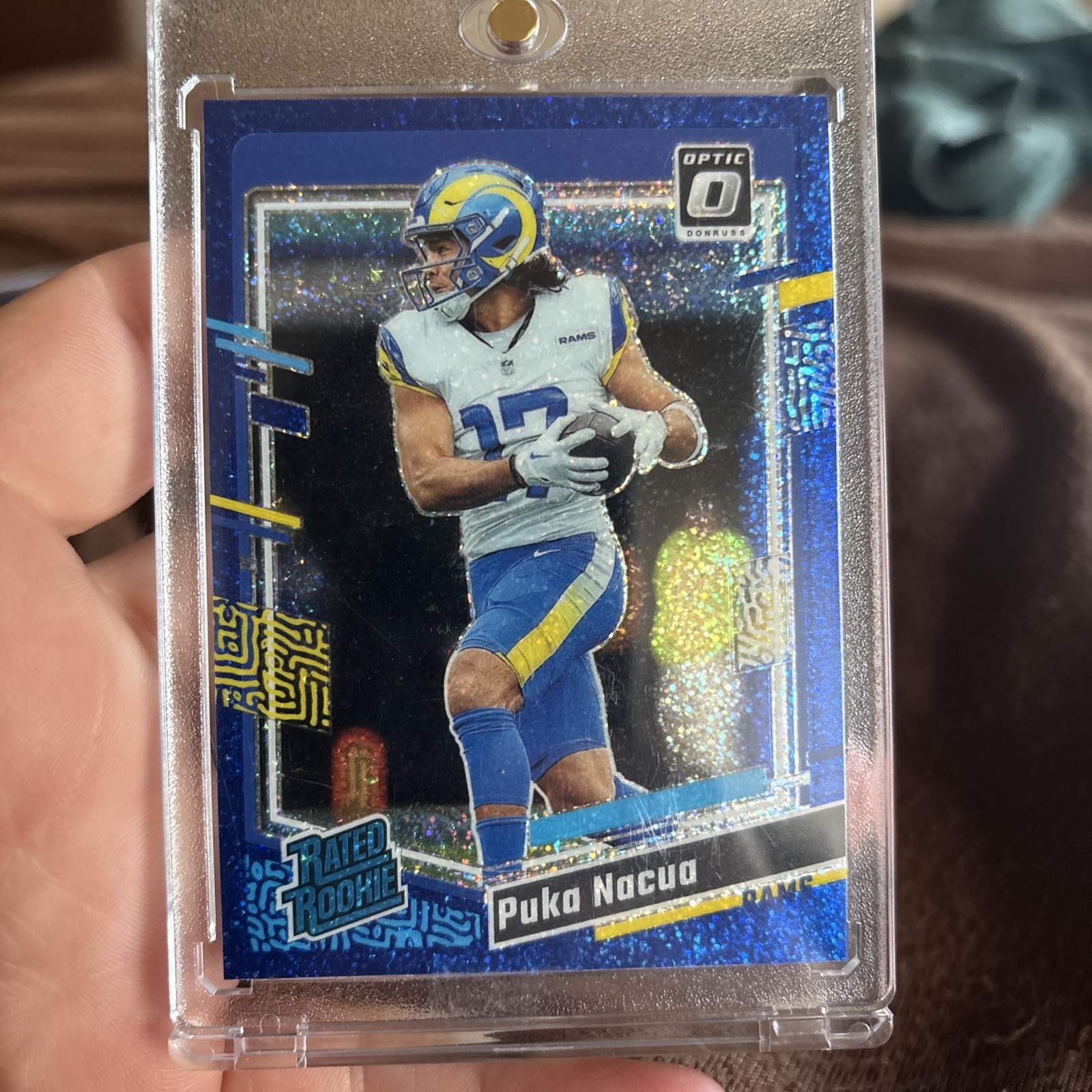 2023 Panini Donruss Optic Puka Nacua Blue Glitter Prizm Rated Rookie #238 Rams