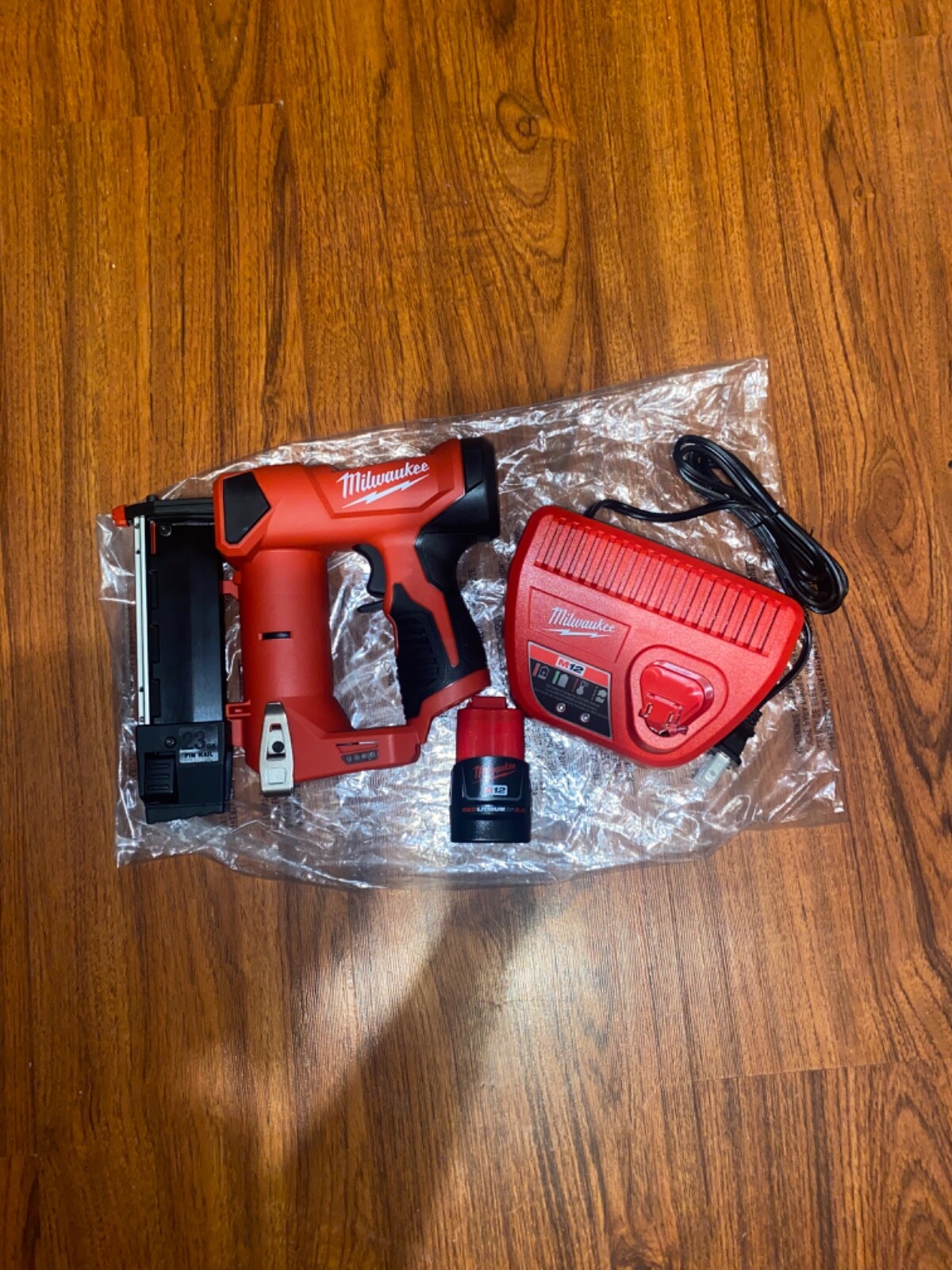 New Milwaukee M12 23 Gauge Pin Nailer Kit 2.0AH Battery & M12 Charger (254021) eBay