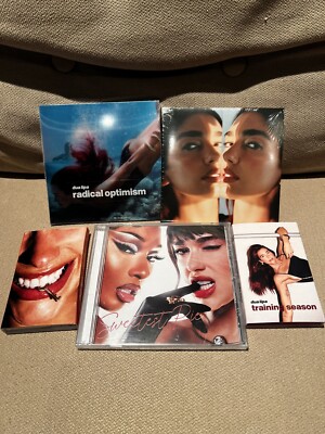 DUA LIPA 5 IN 1 BUNDLE (SIGNED RADICAL OPTIMISM CD, HOUDINI,TS,SWEETEST PIE)