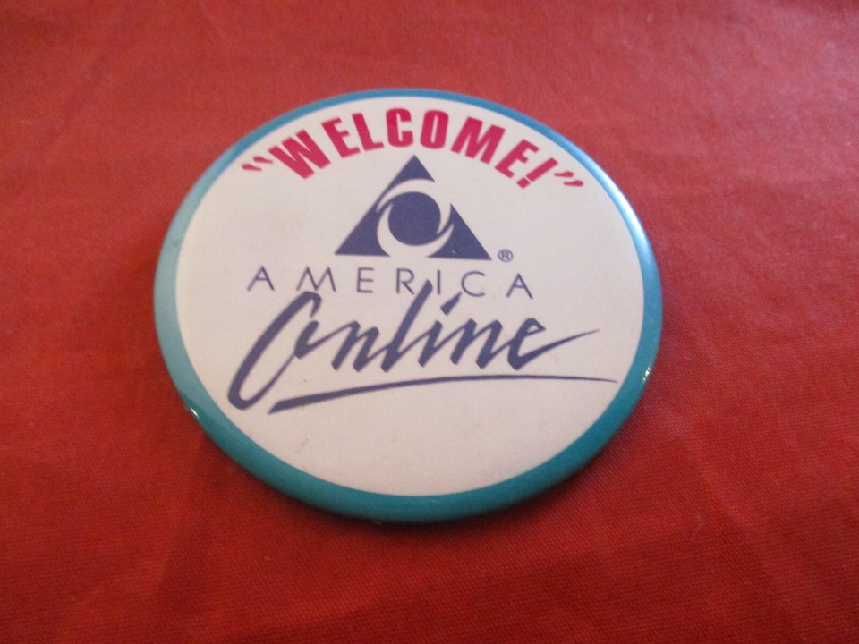 An original AOL promotional pin from the era when CDs rained from the sky — a tiny, perfectly ironic relic of early internet culture.