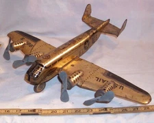 MARX GOLD FOUR ENGINE BOMBER AIRPLANE TIN WIND UP TOY 1930s