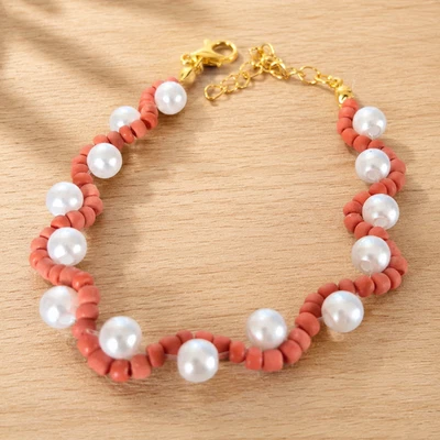 Bracelet femme perles nacrées corail blanc réglable fait main doré - Photo 1/2