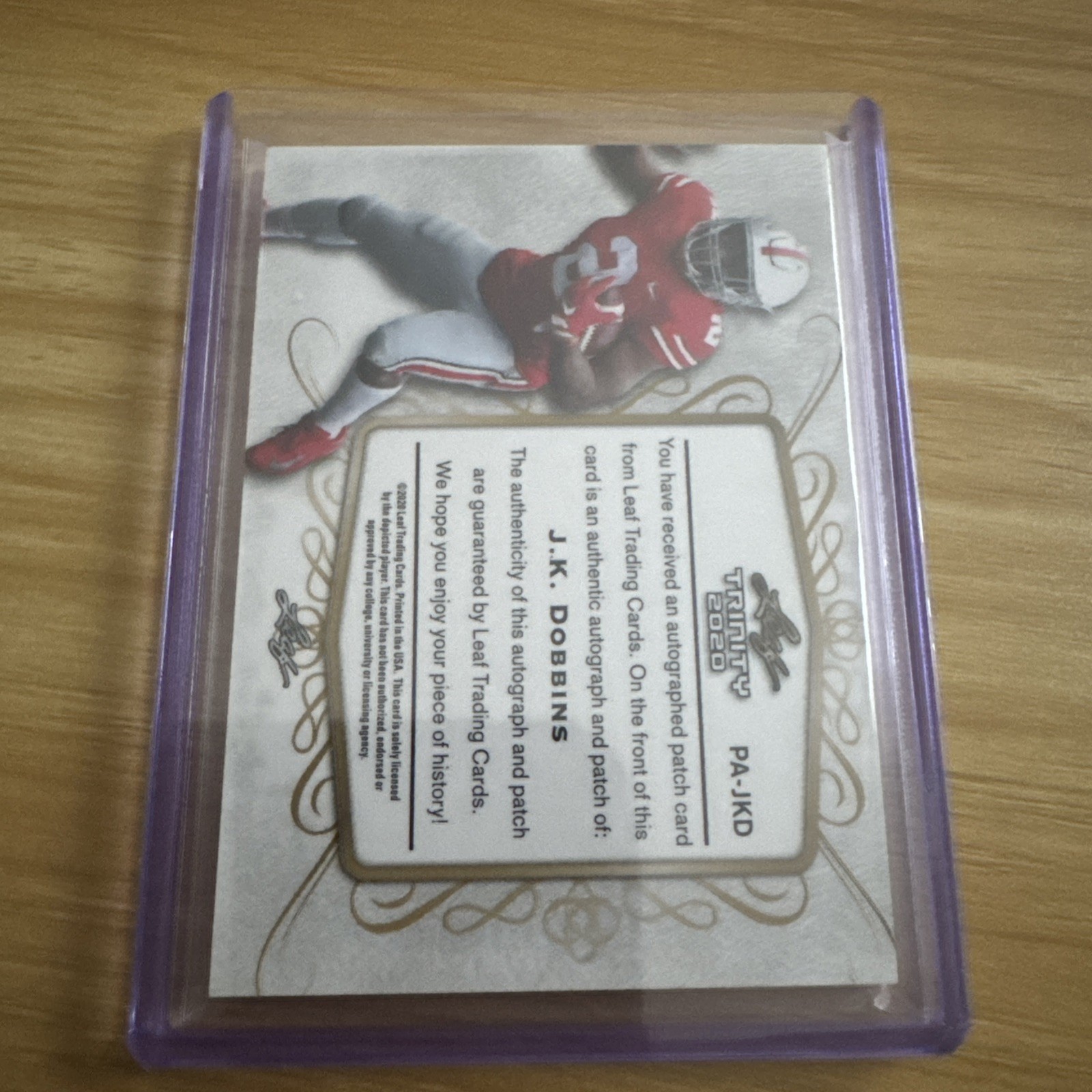 2020 Leaf Trinity - Patch Auto J.K. Dobbins #PA-JKD Platinum Foil /50  view 2