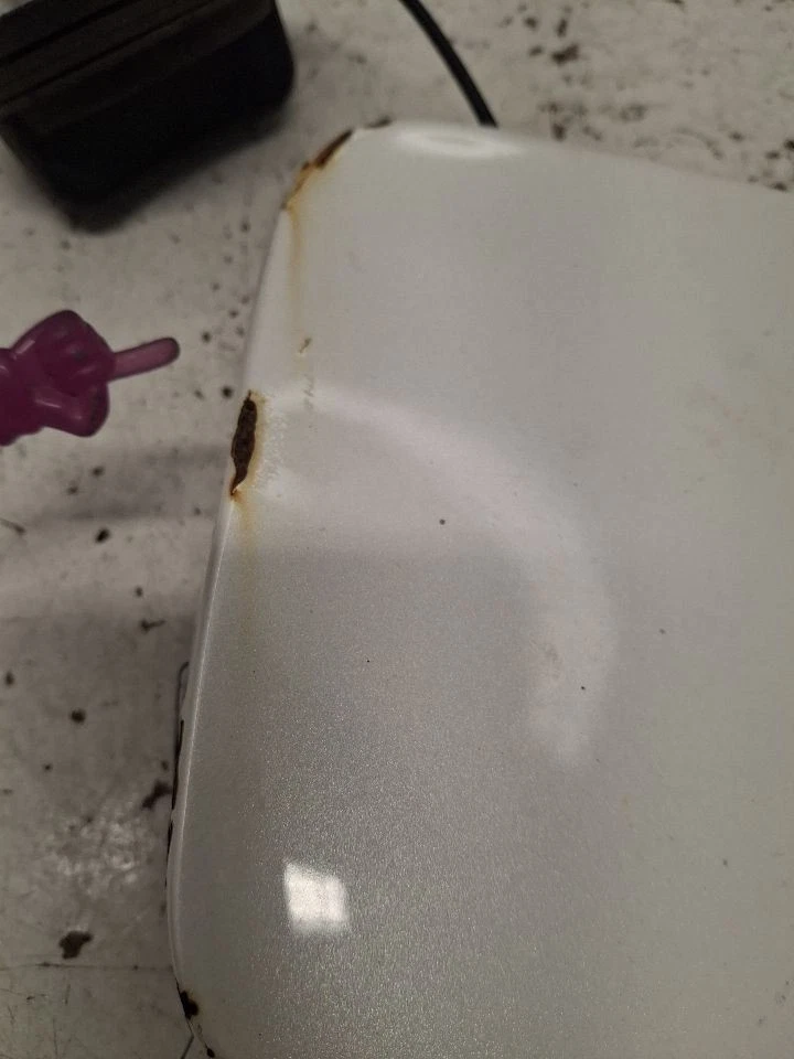 Puerta de llenado de combustible Sentra 2011 1381716 Foto 2 de 4