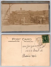 RPPC 1908 Lumber Mill Logs Stacked Winter Scene Michigan MI Postcard