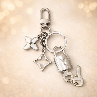 Authentic Louis Vuitton New Silver Padlock + Unbranded Silver Flower Bagcharm