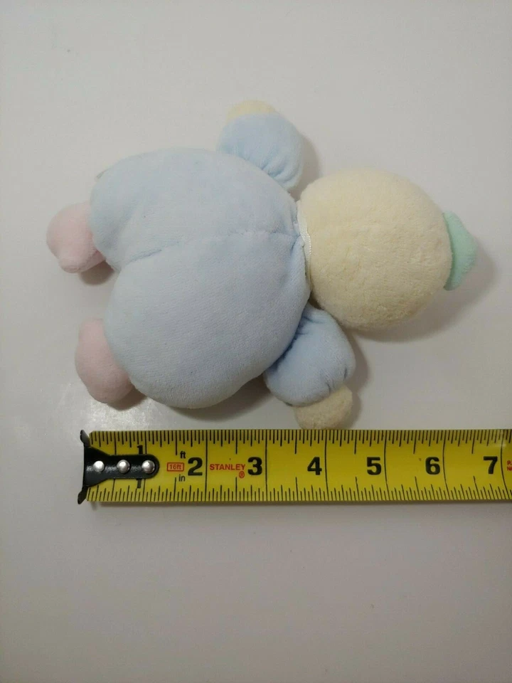 Brinquedo macio Soft Dreams Target pelúcia amarelo azul pato coelho tartaruga bebê chocalho - Imagem 2 de 4