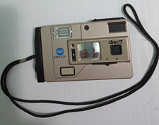 Vintage Minolta Disc-7 Gray 35mm Built In Flash Point  Shoot Compact Camera
