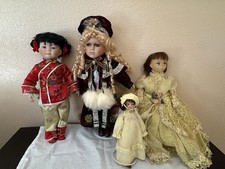 Lot Of 4 Dolls Unsure Of Brand Used In Good Condition