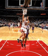 Fred Hoiberg Chicago Bulls leaps to take a shot at the NBA presea- 2002 Photo