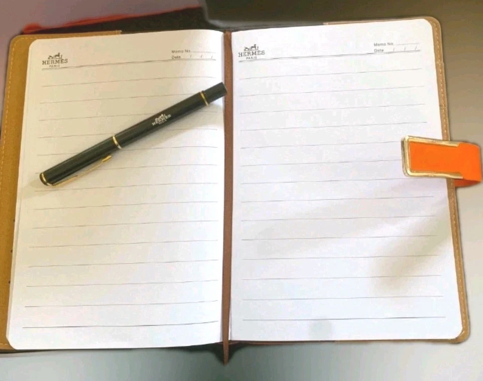 Cuaderno Hermes VIP naranja con bolígrafo GWP Foto 2 de 4
