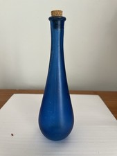 Cobalt blue glass bottle with a cork stopper
