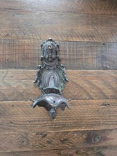 Beautiful cherub metal wall sconce, with glass holopane lamp shade. 