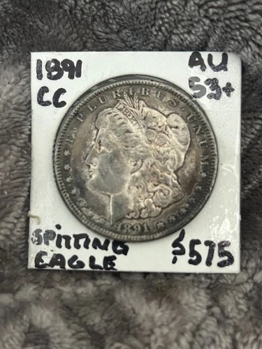 1891-CC Spitting Eagle, MORGAN SILVER DOLLAR, AU details and nicely toned.