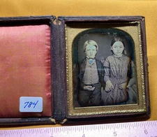 Leather case with early charming dag of two children, 6th plate (L784)