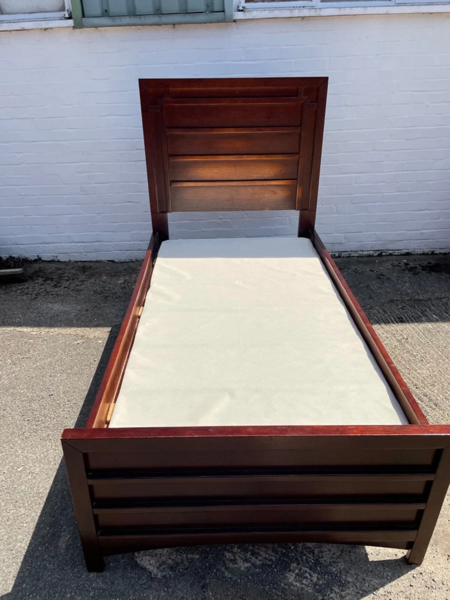 Wooden bed outlet frame with footboard