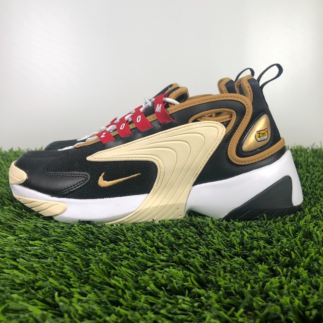 nike zoom 2k sneakers in black and gold