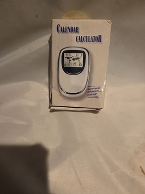 *Tiny pocket Multi function Clock, Calender Calculator--with alarm