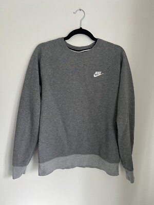 grey nike sweatshirt with red tick