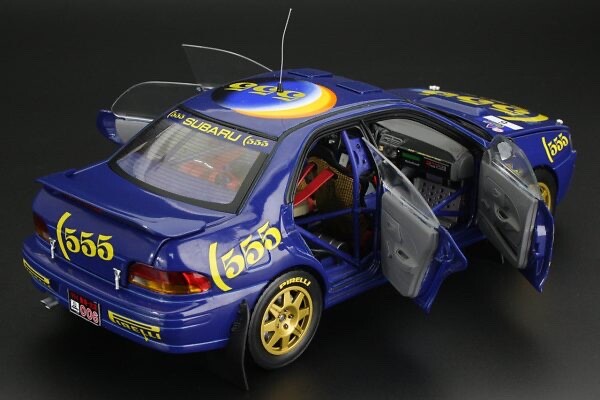 Subaru Impreza WRC ピンバッジセットとミニカー Subaru Impreza WRC ピンバッジセットとミニカー Subaru Impreza