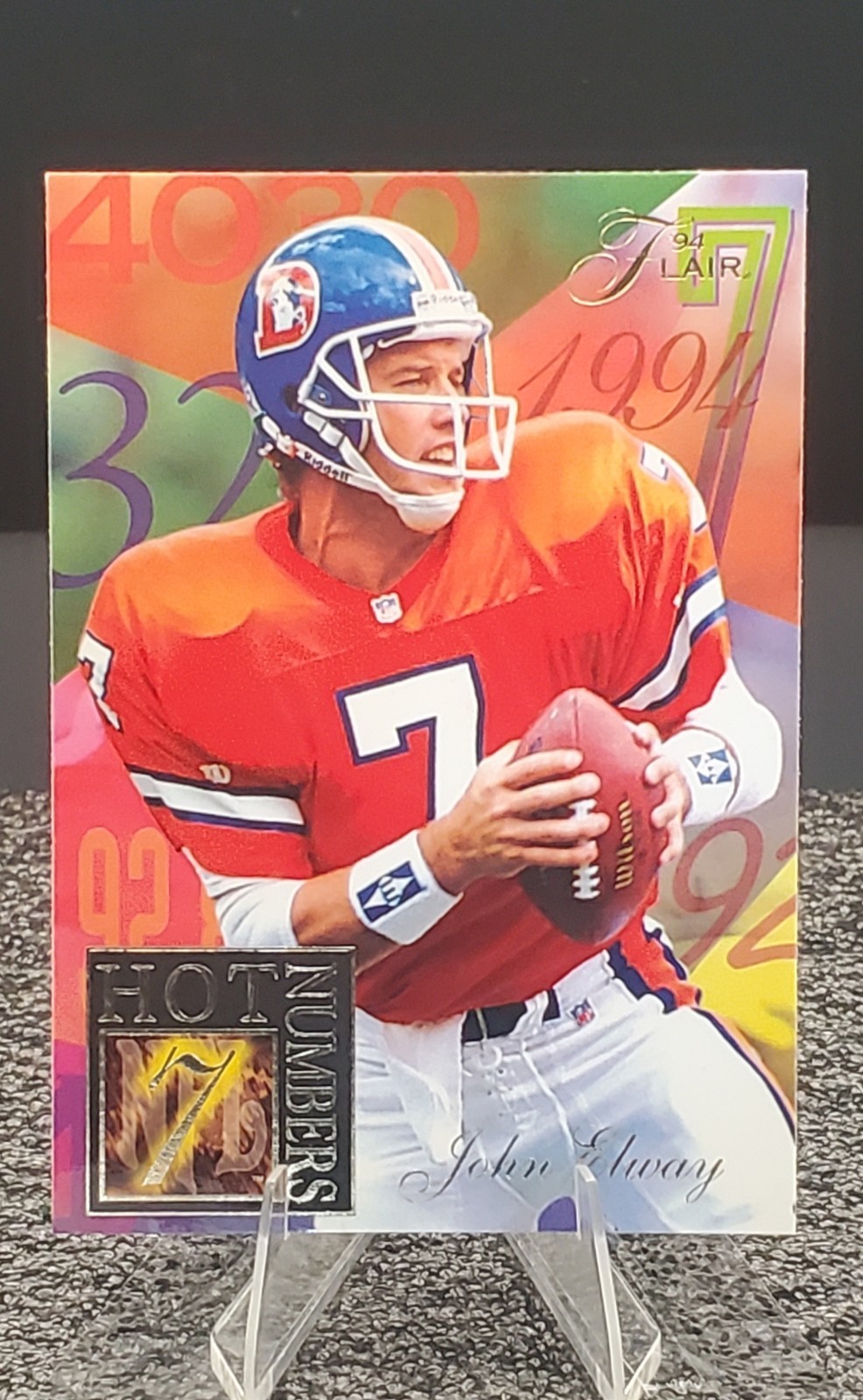 John Elway #4 (Football Cards 1994 Ultra Flair Hot Numbers) — is it worth grading?