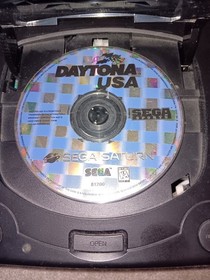 Sega Saturn Controller And Daytona Usa(no case) also includes manuals