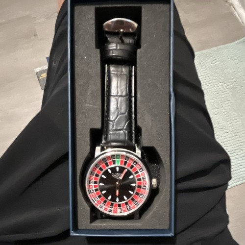 Analog Roulette Dial Wristwatch, Black Leather Strap, Silver Case, Box