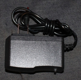 Atari Lynx W. Game Cartridges, and  Carrying Case and power adapter AO4079462