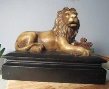 Vintage Sculpture Deplicting a Sleeping Lion