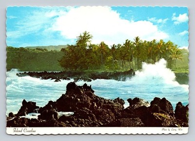 Coastline View of Keanae Peninsula Maui Hawaii with Rocky Shore and Palm Trees