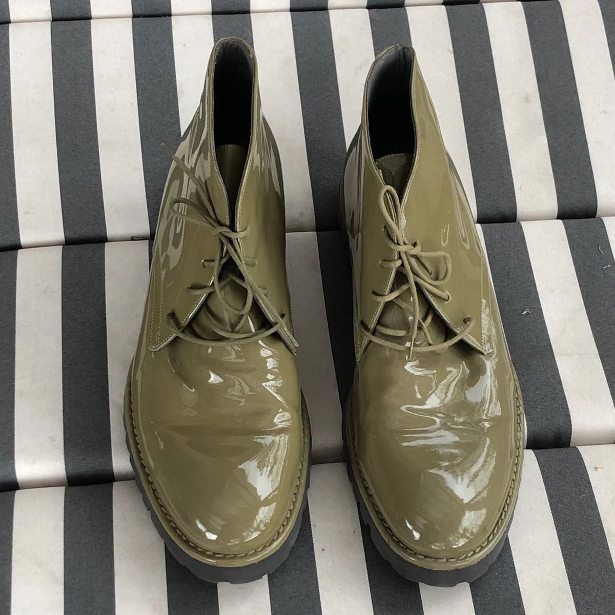 Green patent shop leather boots