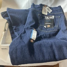 New with tag Dickies size 50X30 men's work jeans relaxed fit, boot cut 30 length