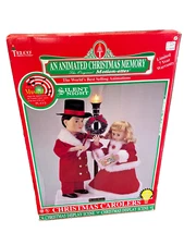 Telco Motion-ettes of Christmas Caroler Animated Girl and Boy Vintage