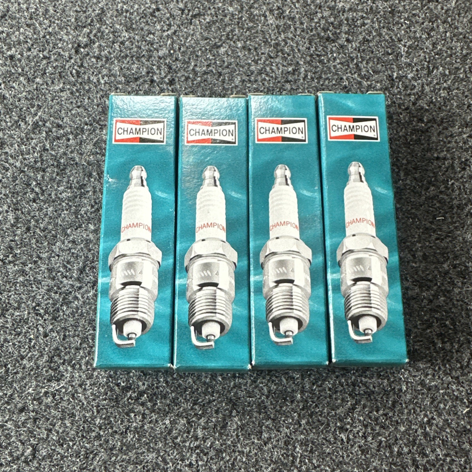 Lot Of 4 Champion Marine Copper Plus 956M Spark Plugs for QC12PEP New Old Stock