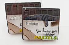 2 sets of six black soft artist pastels