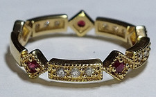 Solid 14k gold ruby  diamond band ring 2.48 grams - sz 7.25