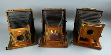 3x Vintage mahogany & brass 1/2 Plate Cameras inc The Artist