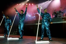 Ricky Bell Ronnie DeVoe and Michael Bivins of New Edition perform- 1988 Photo