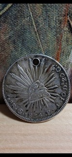 México 1834 Go PJ 8 Real Silver Eagle Coin. (Hole)