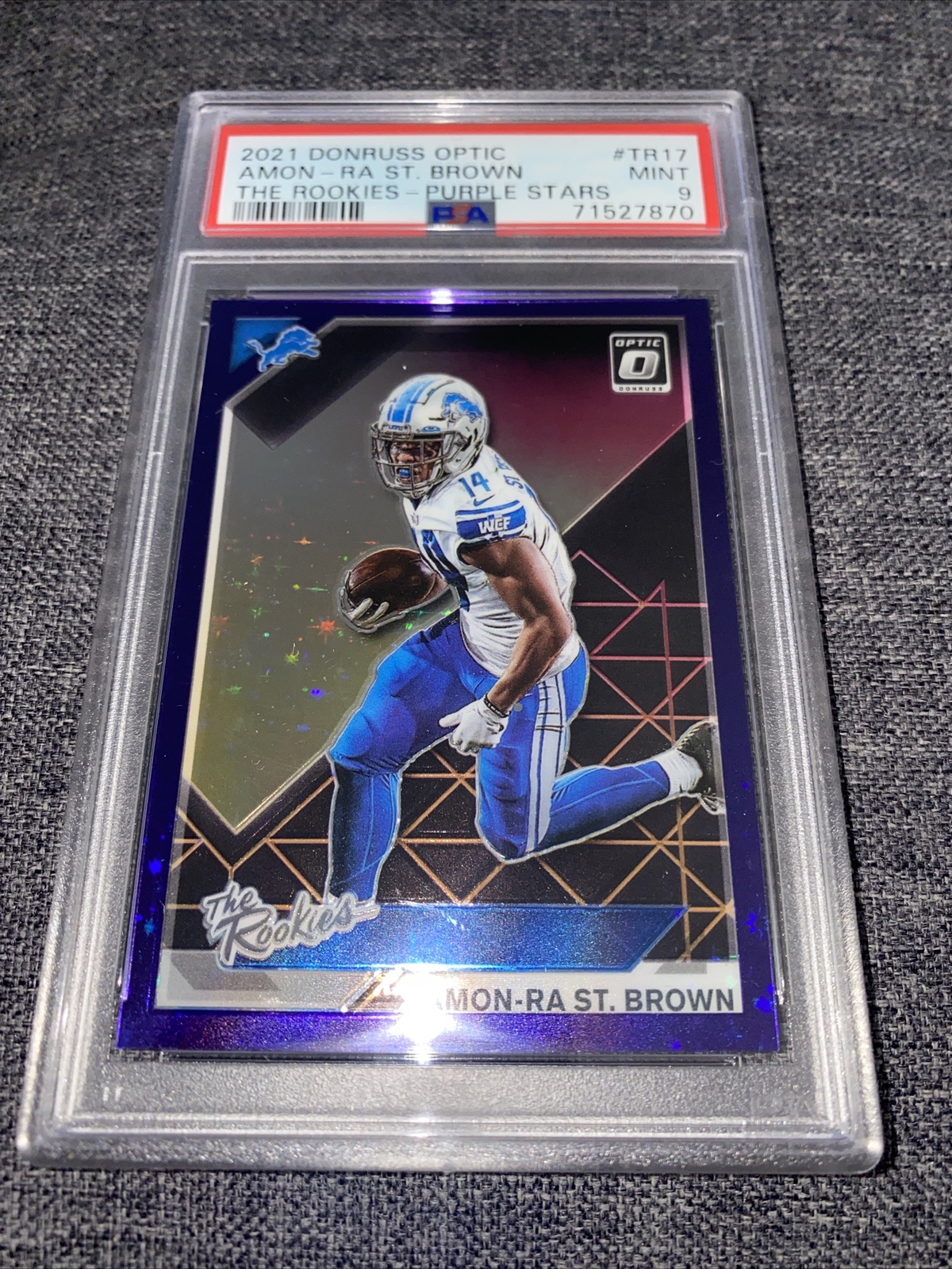 Amon-Ra St. Brown Panini Donruss Optic the Rookies #TR17 Purple Stars