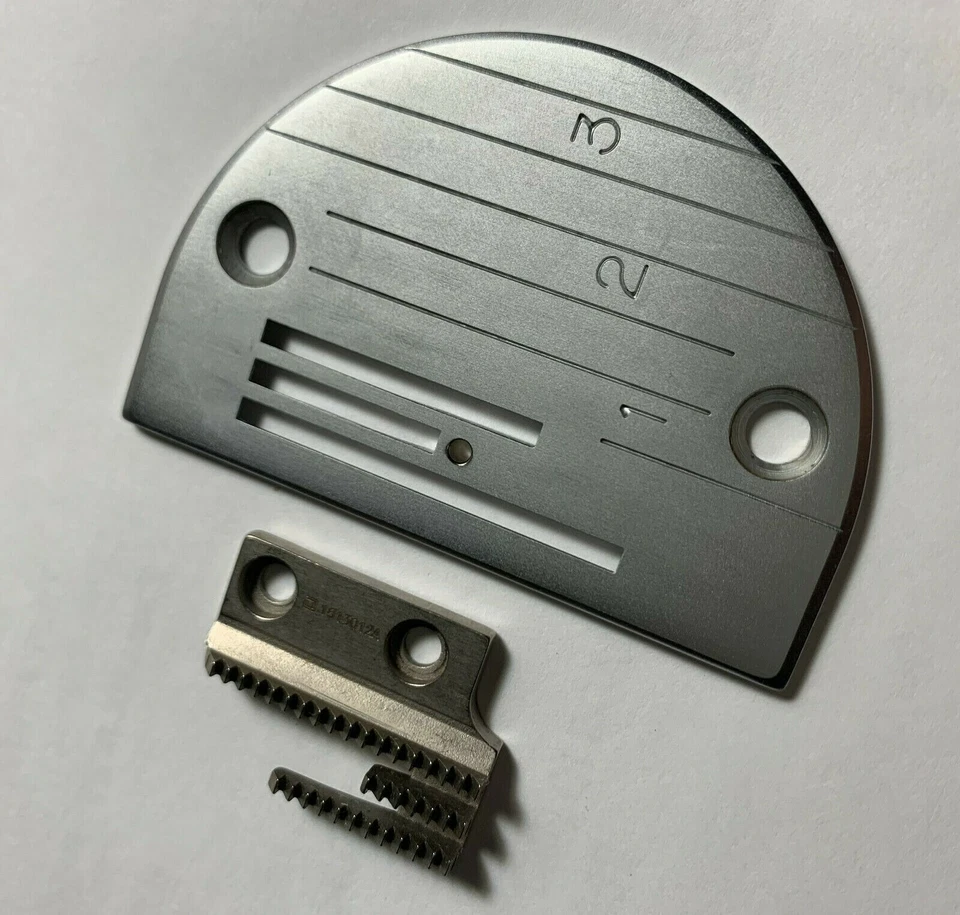 Placa de aguja y alimentación genuina JUKI para perro se adapta a JUKI DDL-5550 y más. Foto 2 de 4