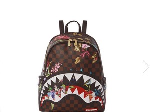 sprayground slime shark backpack
