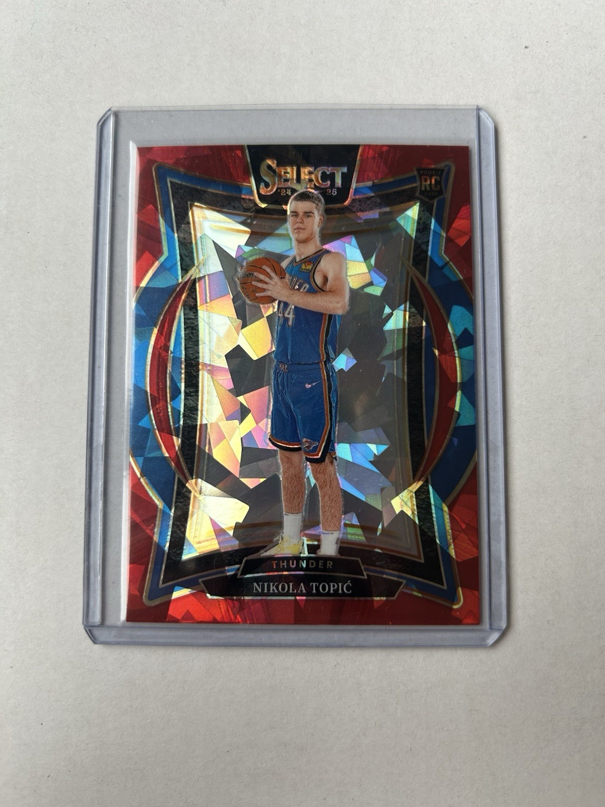 2024-25 Panini Select - Concourse Nikola Topic #89 Red Cracked Ice Prizm (RC)