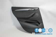 Original BMW  F48  T�rverkleidung hinten links EGAT Stoff Grid / anthrazit 74...