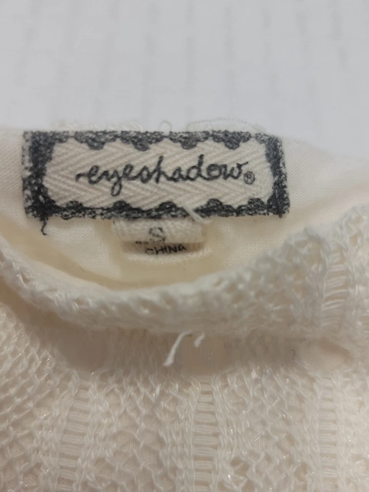 Suéter para mujer marca sombra de ojos manga corta color crema talla pequeña Foto 3 de 4