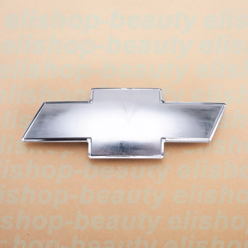 NUEVO 1999-02 Silverado 2000-06 Tahoe Suburban Parrilla Frontal Emblema Pajarita Plateado Foto 3 de 4