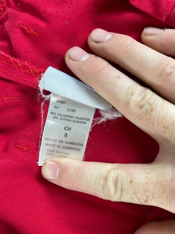 Pantalones exfoliantes rojos para mujer pequeños bolsillos con cordón Foto 2 de 2