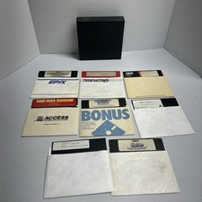 Commodore 64 / 128 5.25" floppy Disc lot of 8 discs. With Hard Case