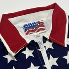White vintage Flag Wear jacket with red and blue stars and “Made in U.S.A.” label on collar.
